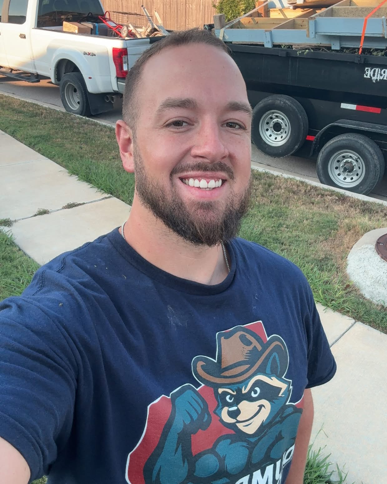 Gage from Dumpster Daddies Junk Removal with trailer loaded after a job in Leander, TX